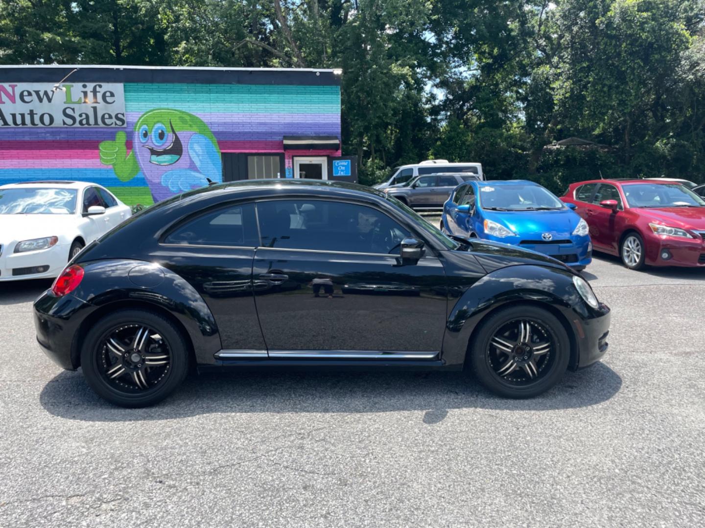 2012 BLACK VOLKSWAGEN BEETLE 2.5L PZEV (3VWJP7AT0CM) with an 2.5L engine, Automatic transmission, located at 5103 Dorchester Rd., Charleston, SC, 29418-5607, (843) 767-1122, 36.245171, -115.228050 - Local Trade-in with Leather, CD/AUX/Bluetooth, Hands-free Phone, Power Windows, Power Locks, Power Mirrors, All-weather Mats, Keyless Entry, Alloy Wheels. Clean CarFax (no accidents reported!) Only 68k miles! Located at New Life Auto Sales! 2023 WINNER for Post & Courier's Charleston's Choice Pre - Photo#8